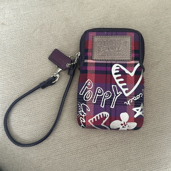 Coach Handbags - Selling a cute purple & pink Coach wristlet! Fits your basic items & cards.